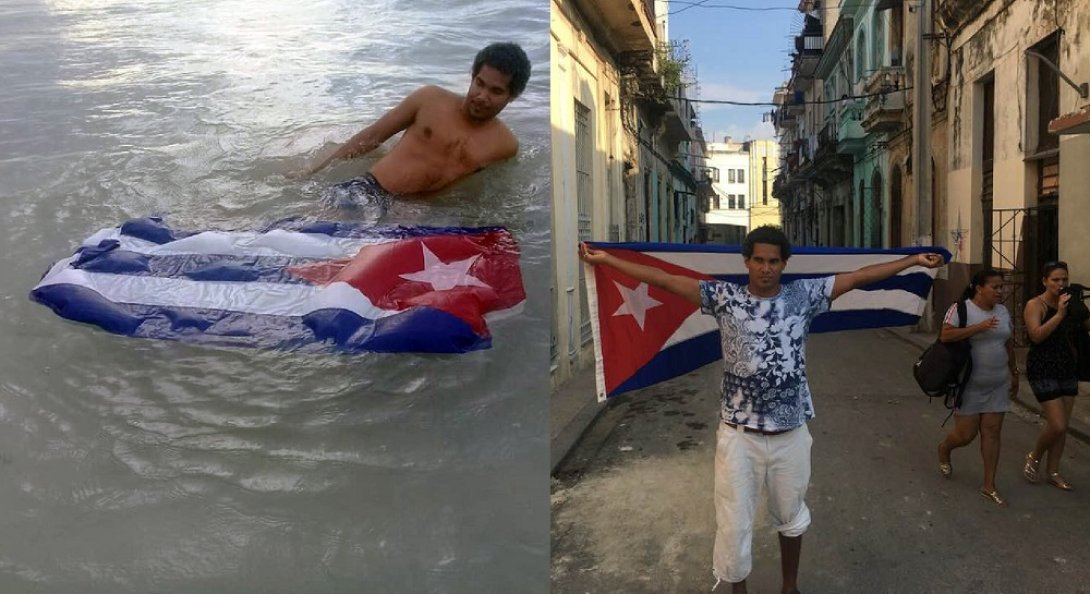 El artista Otero Alcántara con la bandera cubana. Performance Performance "Le Drapeau" 1