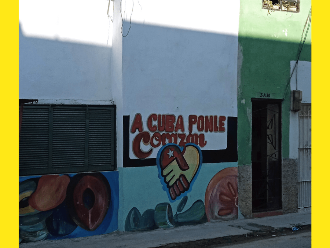 Dibujo en la pared: "A Cuba ponle corazón" en La Habana, Cuba.