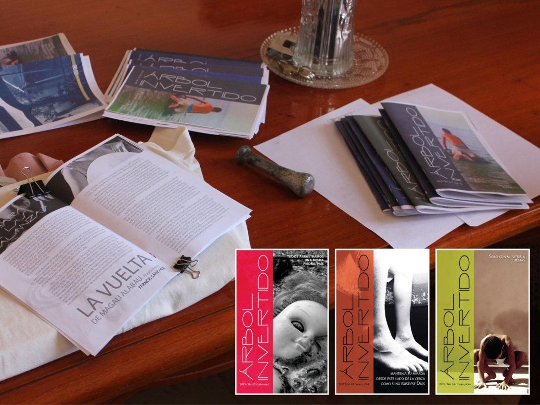 Mesa de trabajo y ejemplares impresos de la revista Árbol Invertido. Proceso artesanal de impresión, armado y preparación de los números destinados a su circulación mediante liberaciones en espacios públicos. Ciego de Ávila, Cuba, 2015.