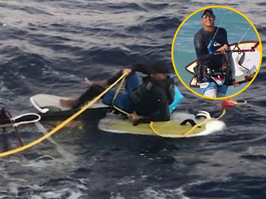 El cubano Elián López al llegar a EEUU en la tabla de surf.