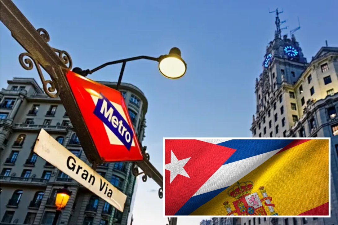Metro de la Gran Vía en Madrid y banderas de Cuba y España