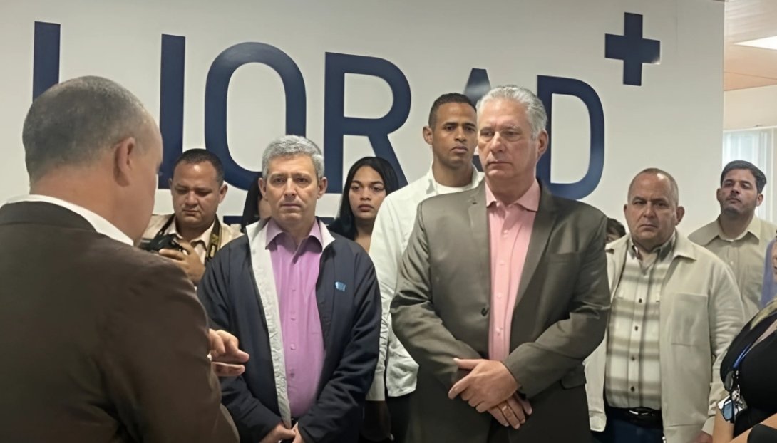 Roberto Perdomo Di-Lella junto a Miguel Díaz-Canel.