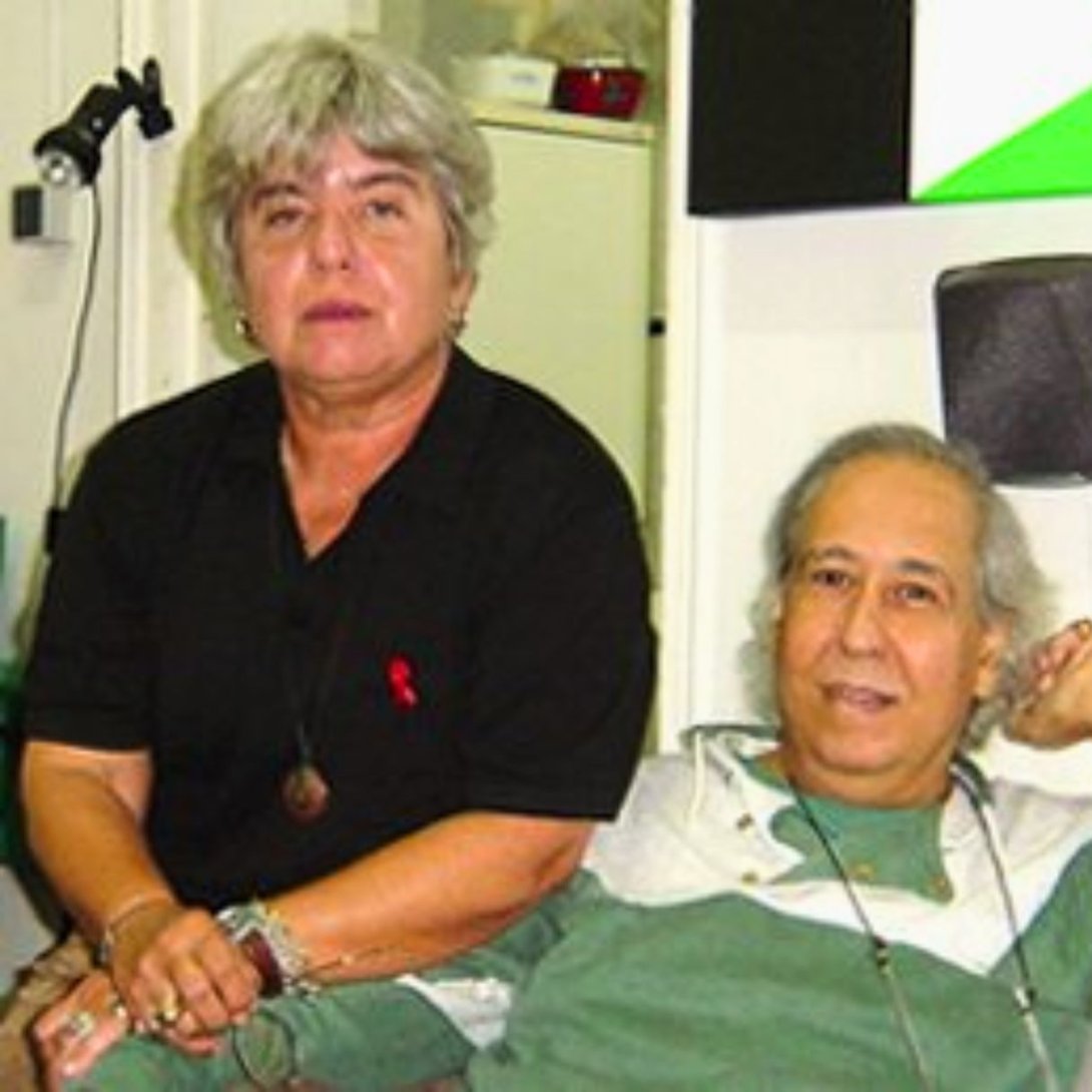 Los poetas cubanos Isel Rivero y José Mario.