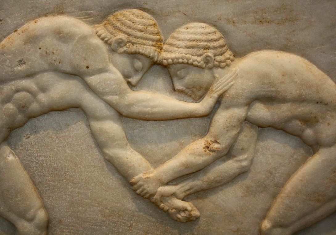 Luchadores griegos, bajorrelieve (510 a.n.e). Museo Arqueológico Nacional, Atenas, Grecia.