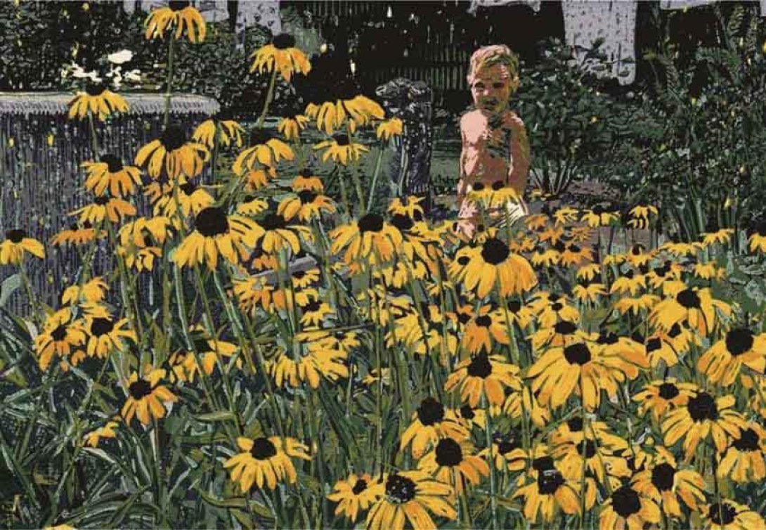 Niño entre girasoles. Foto: Michal Cihlář