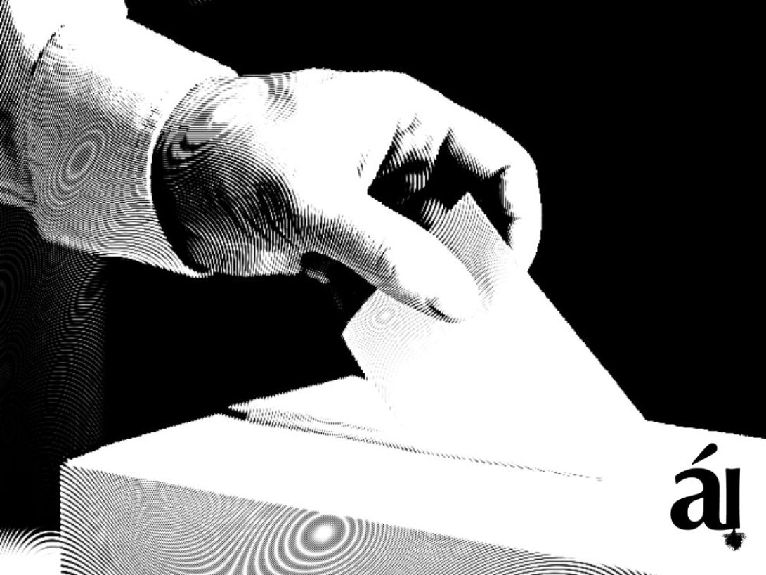 boleta electoral y mano