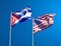 Banderas de Cuba y Estados Unidos.