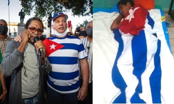 Presidente cubano Díaz Canel y artista Otero Alcántara con bandera cubana.